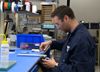 Dymax Application Engineer Testing Customer Parts